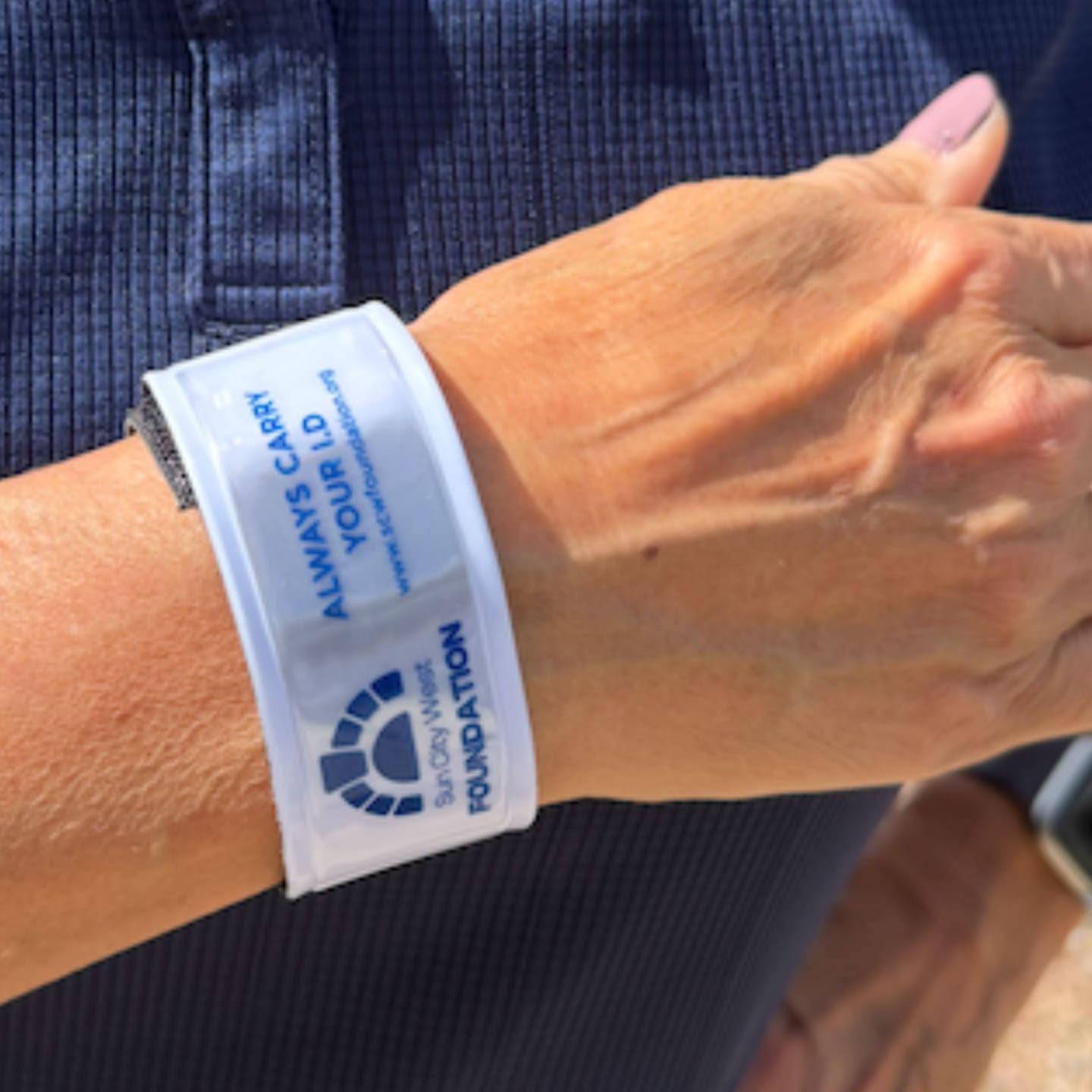 Reflective wristband from the Safe Walker Program that improves visibility for evening walkers.